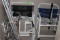 Group of medical supplies including crutches, walkers, shower seats and por
