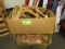 Two boxes of wooden hangers