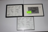 Three framed menus with chef's signatures