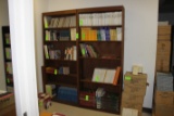 Five sections of laminate wood bookcase shelving