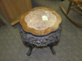 Carved four-leg table with marble inlay