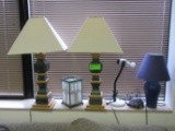 Two matching table lamps, two table lamps, turtle, and a reading light