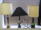 Four table lamps and a reading light