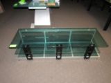 Glass top shelved coffee table, 63-1/4