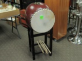 Double sided drum on stand with sticks