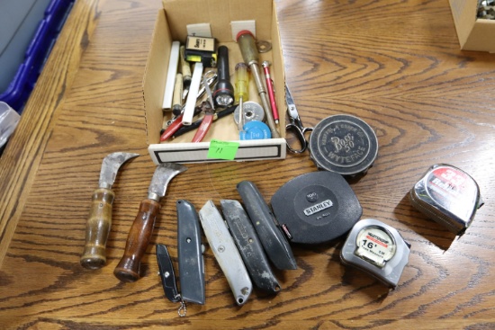 Hand tools and tape measures including scissors, wire strippers, tape reel, tire pressure gauges