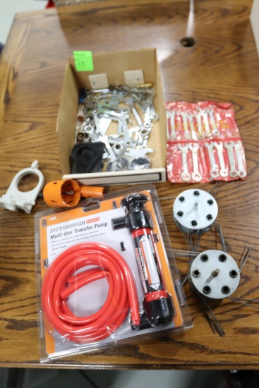 Roto strippers, pole saws, small wrenches, and a Pittsburgh multiuse transfer pump