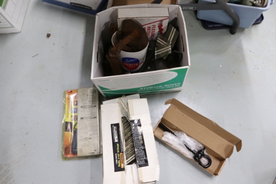 Nails, lighters, miscellaneous metal hardware, and a box of flexible metal corner tape