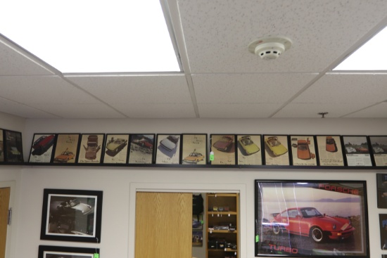 Set of framed vintage automotive magazine ads