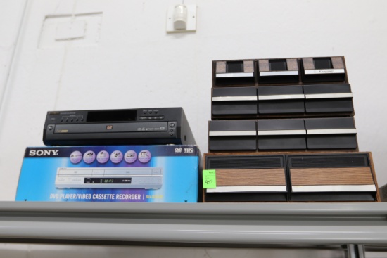 Hitachi DVD video player and a Sony DVD video cassette player, with VHS and cassette drawers