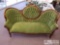 Victorian Green sofa with ornate wood