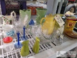 Approximately 23 pieces of glass and ceramic vases, bowls and glasses