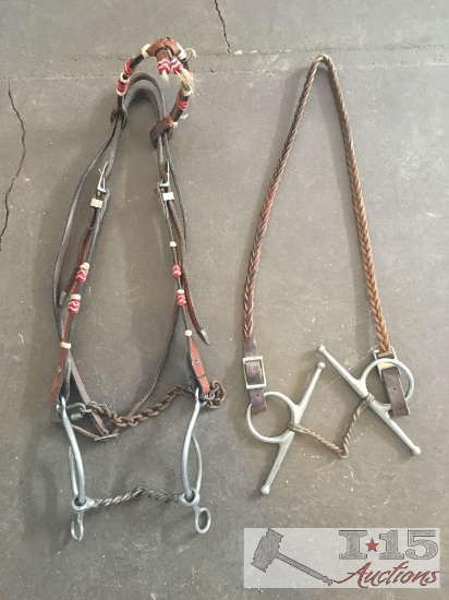 2 headstalls with bits