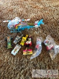 Vintage windup police toy helicopter and toy cars