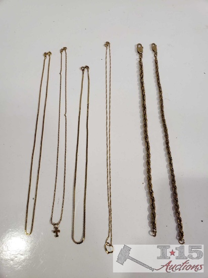 4 Gold Necklaces and 2 14k Gold Braclets
