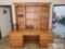 A desk, 2 Hutches, 2 Chairs, Credenza and a Cabinet