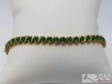 14k Gold Bracelet with Green Gemstones
