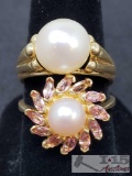 2 14k Gold Rings with a Fresh Water Pearl. The Bottom Ring is Accented with Semi Precious Stones.