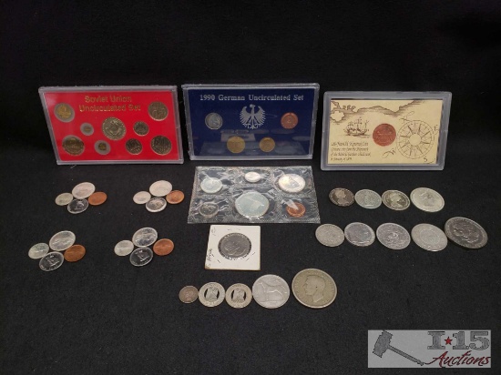 1988 Soviet Union Uncirculated Set, 1990 German Uncirculated Set, a Nazi Coin, 1967 Canadian Coins