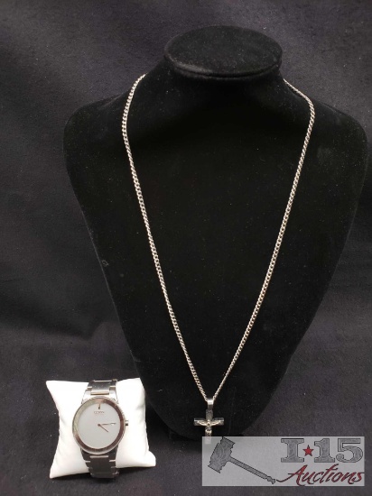 Citizen Eco-Drive Watch and a Stainless Steel Necklace with a Stainless Steel Cross