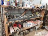 A Shelving Unit filled with tools and other Misc. Items
