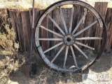 Post Hole Digger and Large Wagon Wheel