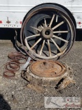 A Wagon Wheel and other misc Yard art