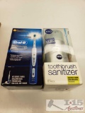 New Oral B Professional Care Electric Toothbrush and Vio Light Toothbrush Sanitizer