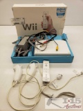 Nintendo Wii Console with Power/Video Cord, Remote and 2 Nunchucks