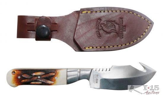 The Bone Collector Fixed blade knife with bone handle and leather holster.