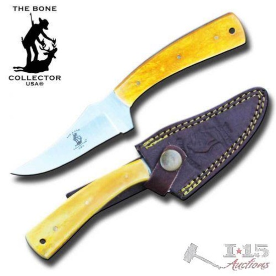 Skinner Knife. Features yellow bone handle, stainless steel blade