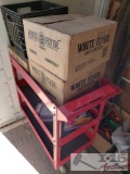 Red Metal Roll Cart with Boxes of Clay Pigeons