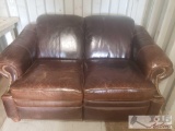 2 Dark Brown Leather Couches With Rivets Full size and love seat
