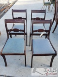 4 Dark Wood Chairs With Blue Padded Seats