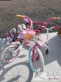 Two Child Huffy Bike and a Fiker J2