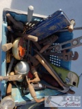 Misc. Vintage and antique tools, pic axe, axe, bubble level, hammers, (blue crate not included )