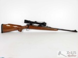 Remington Model 700 Bolt Action .30-06 SPRG Rifle with Bushnell Scope