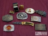 Assorted Belt Buckles, Lionel Pocket Knife, and Lighter