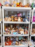 4 Shelves of Winnie The Pooh Collection l, Stuffed Animals, Various Other Disney Dolls and More..