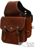 Tooled leather saddle bag with antique copper hardware.