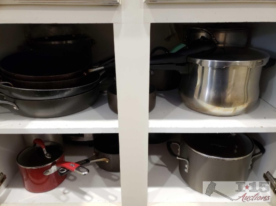 Cabinet Full of Pots, Pans, and Hamilton Beack Crock Pot