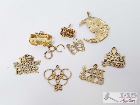 Eight 14k Gold Pendents, 7.4g