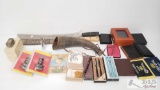 Two Machetes, Nine Wallets, Pens, Magnets and More