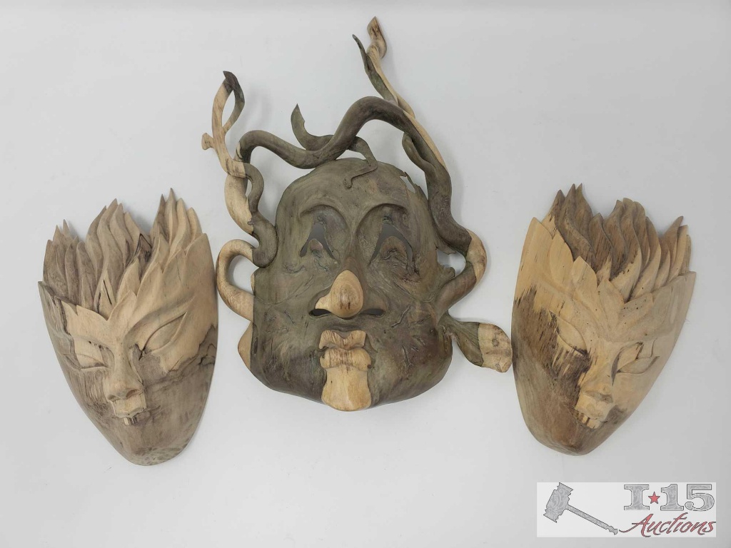 Three Hand carved Hibiscus wood Masks made out of natural wood