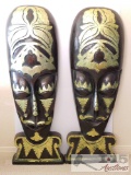 Pair of the monumental size and exceptional quality of oversize pair of Masks finishing with 