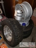 Two Stock Ford Wheels, Two Rims, Four Hubcaps and Aftermarket Wheel & Tire