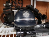 Police helmet, belt and flashlights