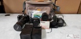 2 canon cameras, 1 vivitar lense, 1 canon camcorder, 2 canon flashes, 1 ltd case