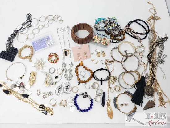 Wide array of jewelry items, earrings, necklaces, clips, rings, beads, bracelets, etc.