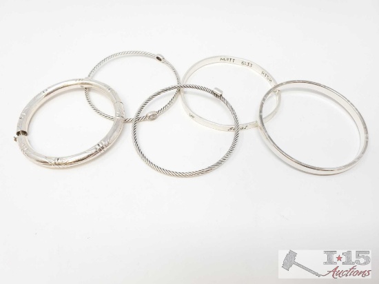 Five stackable silver bracelets